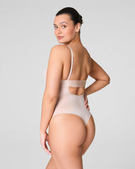 SPANXshape™ Suit Your Fancy Plunge Low-Back Thong Bodysuit | Champagne Beige